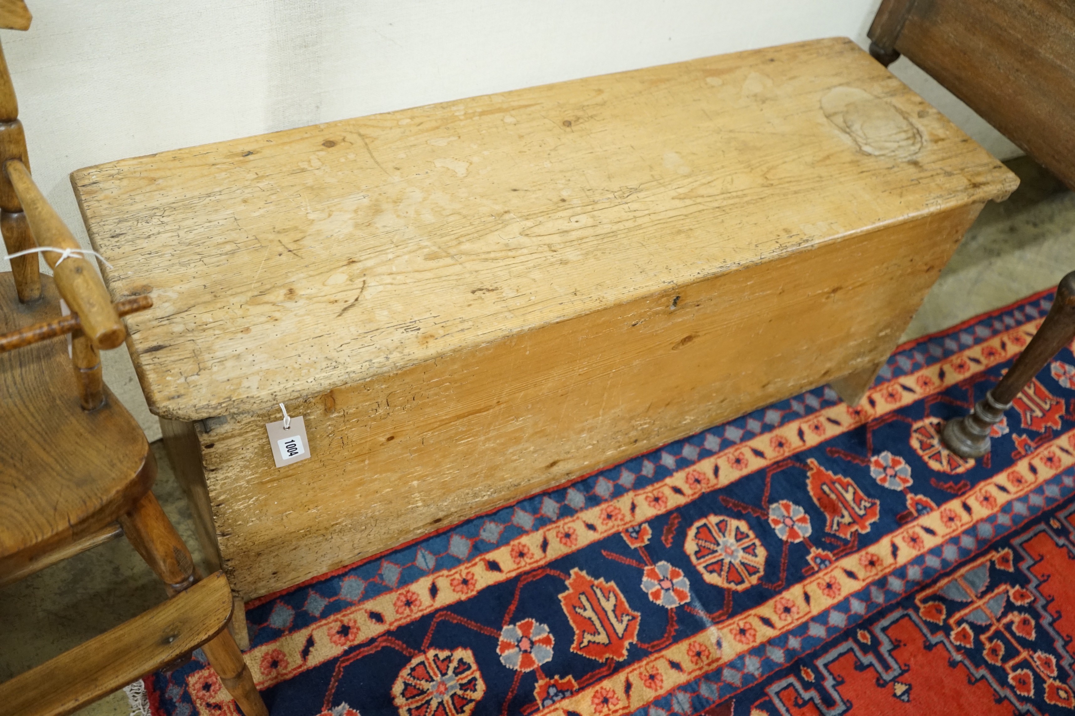 An early 19th century pine six plank coffer, length 115cm, depth 38cm, height 51cm